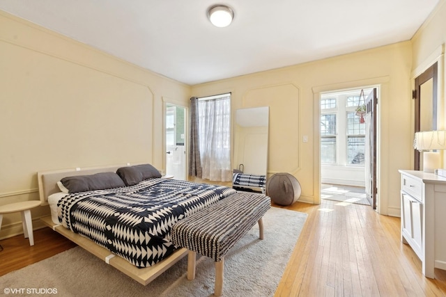 bedroom featuring light wood-style flooring