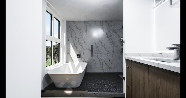 bathroom featuring vanity and a tub