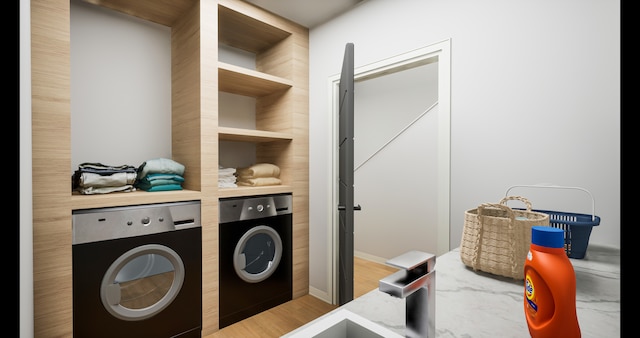 laundry room featuring separate washer and dryer, sink, and built in shelves