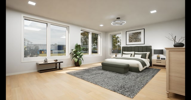 bedroom with hardwood / wood-style floors