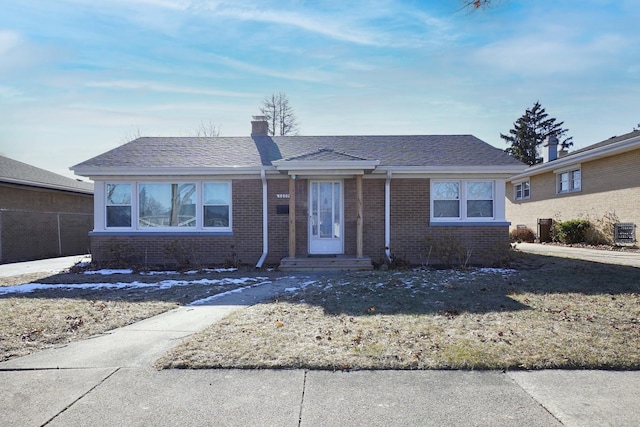 single story home featuring central air condition unit