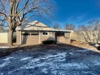 exterior space with a garage