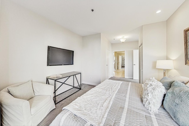 bedroom with light colored carpet