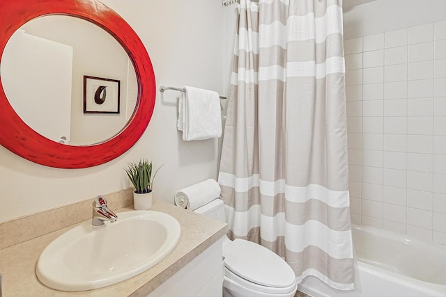 full bathroom with vanity, shower / bath combination with curtain, and toilet