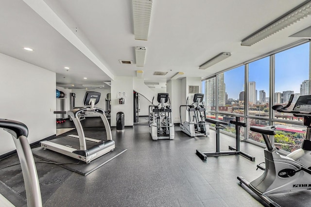 gym featuring floor to ceiling windows