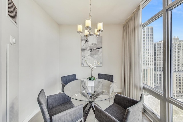 dining room featuring a notable chandelier