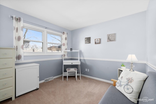 sitting room with light colored carpet