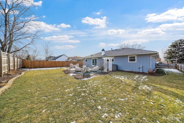 back of property with central air condition unit, a patio, and a yard