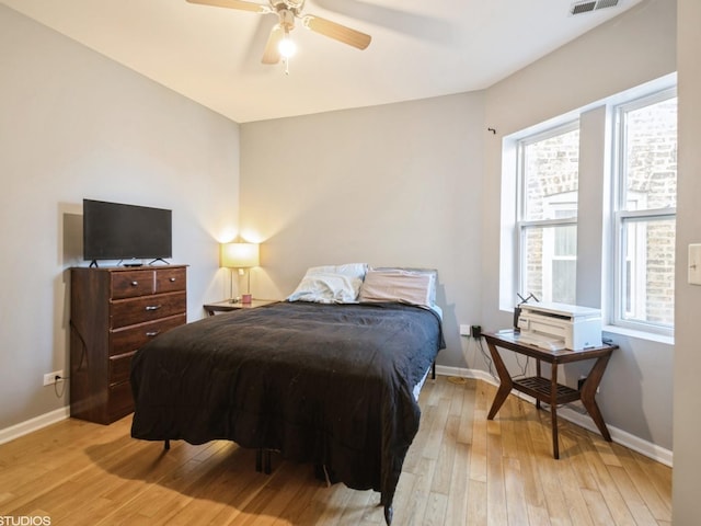 bedroom featuring ceiling fan and light wood-type flooring