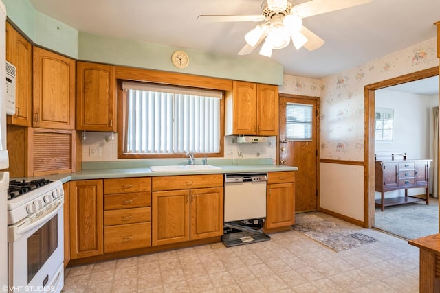 kitchen featuring ceiling fan, white appliances, and sink