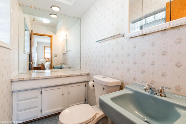 bathroom with tile patterned floors and sink