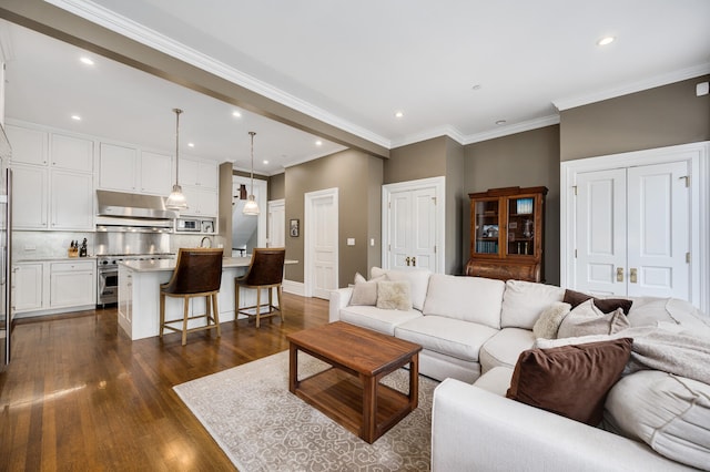 living room featuring crown molding and dark hardwood / wood-style floors