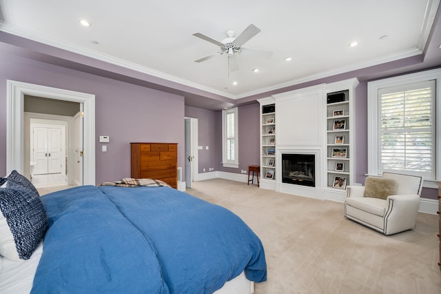 bedroom with ceiling fan, crown molding, and light carpet