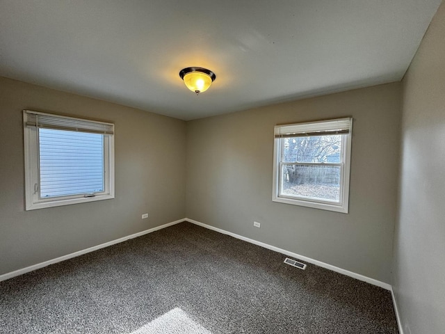 view of carpeted spare room