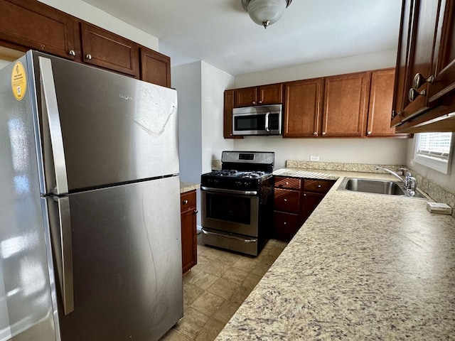 kitchen with sink and stainless steel appliances