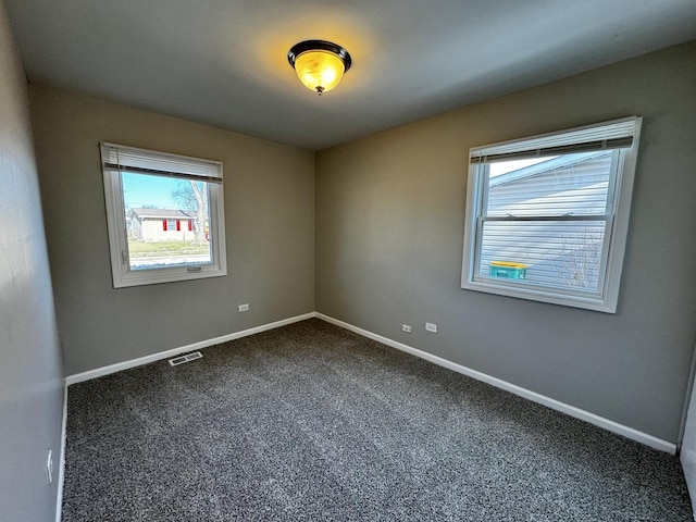 view of carpeted spare room