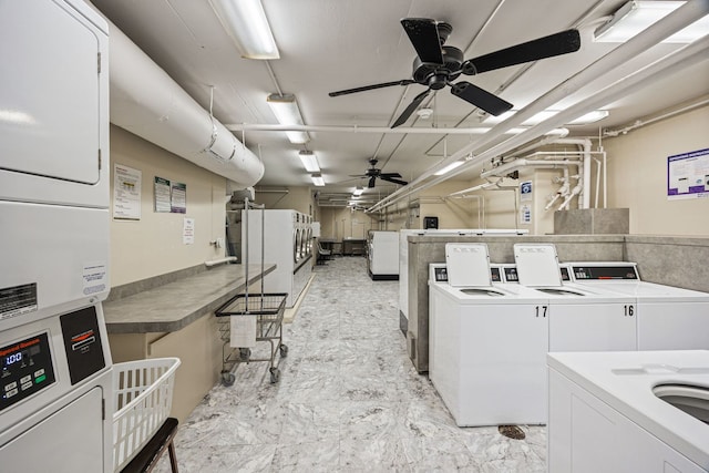 clothes washing area with ceiling fan, washing machine and clothes dryer, and stacked washer and dryer