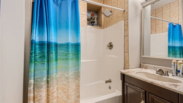 bathroom with vanity and shower / bath combo