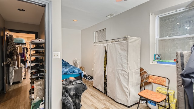 spacious closet featuring light hardwood / wood-style flooring