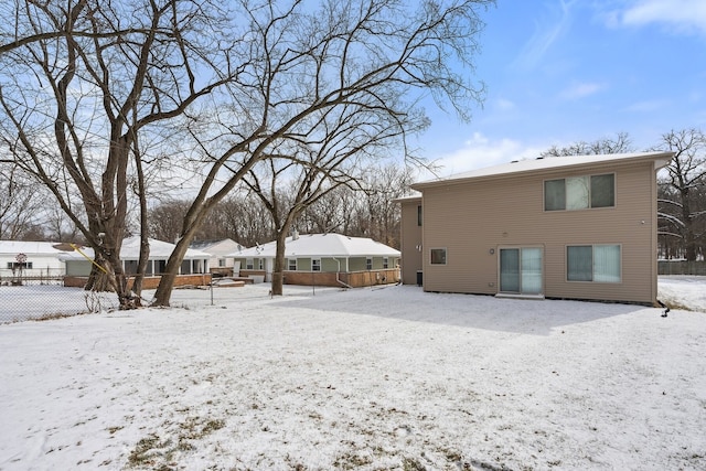 view of snow covered house