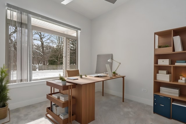 carpeted office with vaulted ceiling