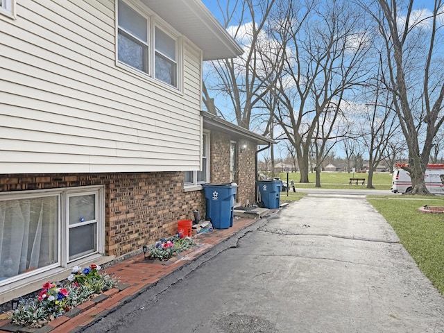 view of home's exterior featuring a lawn