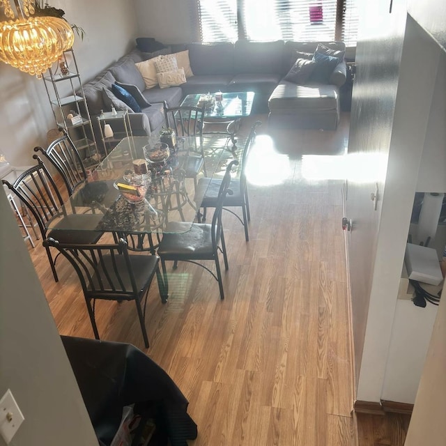 dining area featuring wood-type flooring