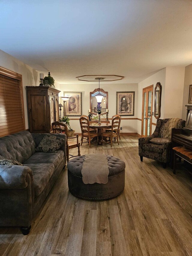 living room with hardwood / wood-style flooring