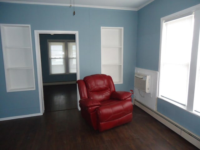 living area featuring a wall mounted AC, a baseboard heating unit, dark wood-type flooring, and crown molding