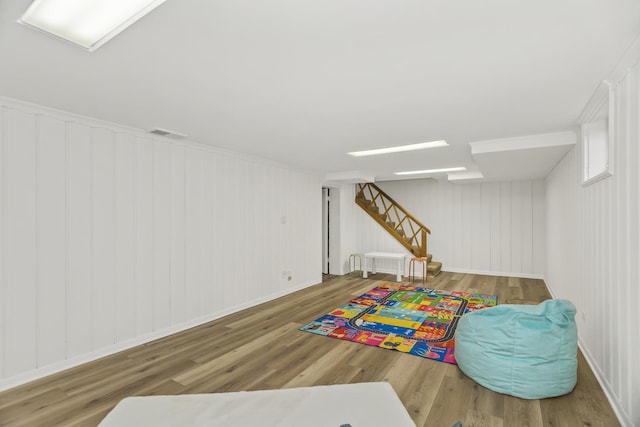 playroom featuring hardwood / wood-style floors