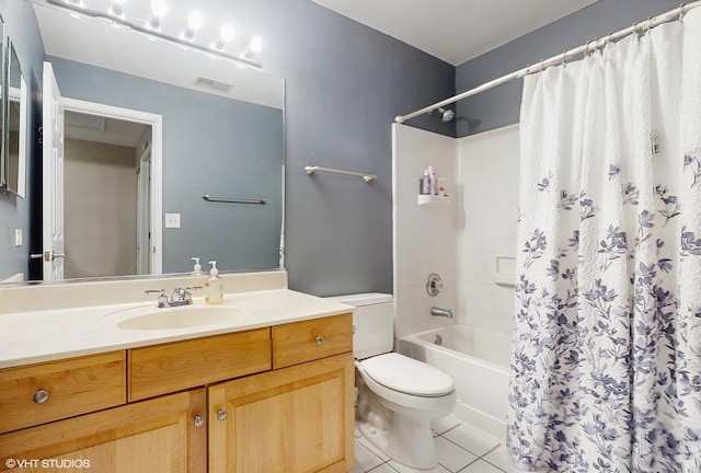 full bathroom featuring toilet, vanity, shower / bath combo, and tile patterned flooring