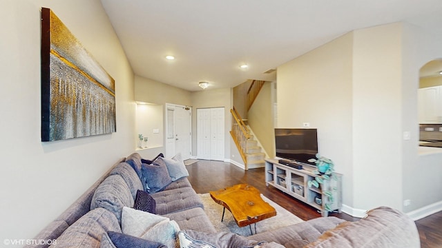 living room with dark hardwood / wood-style floors