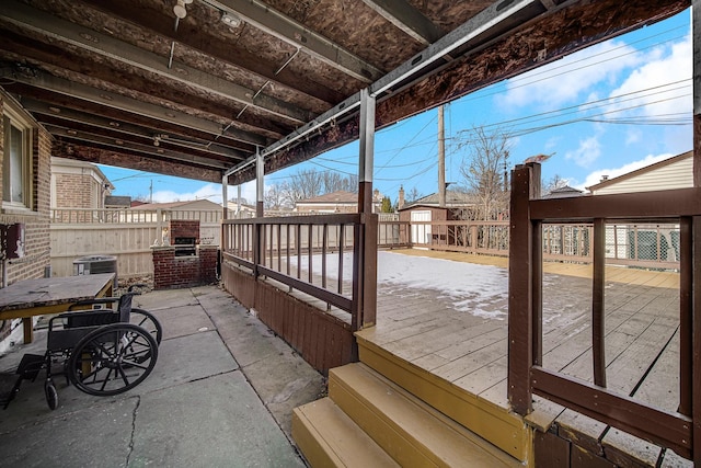 wooden deck featuring a patio area