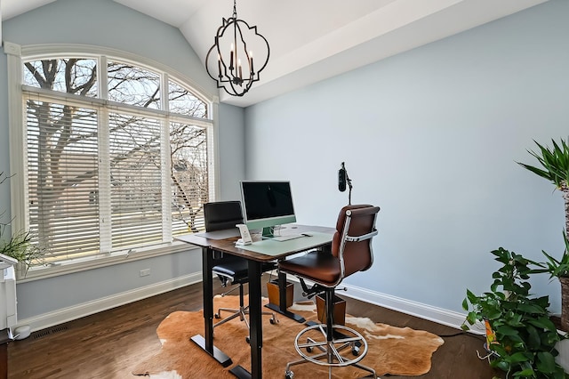 home office featuring a notable chandelier, vaulted ceiling, and dark wood-type flooring