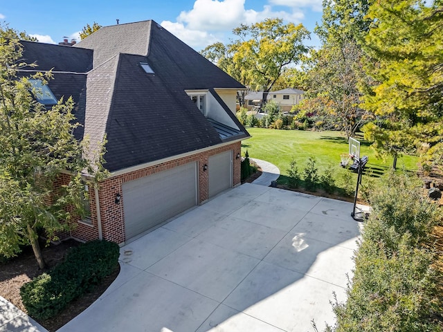 view of property exterior featuring a garage and a lawn