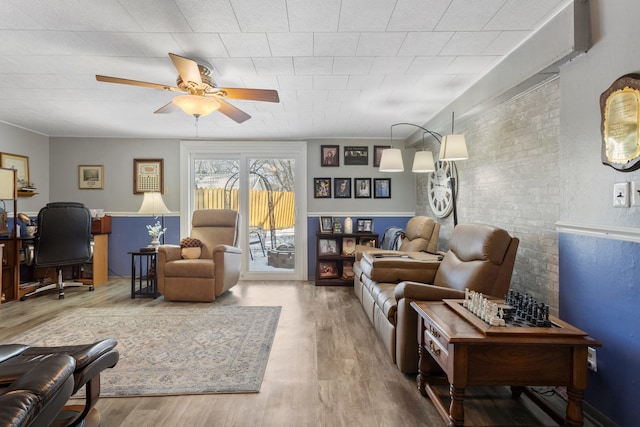 interior space featuring hardwood / wood-style flooring and ceiling fan