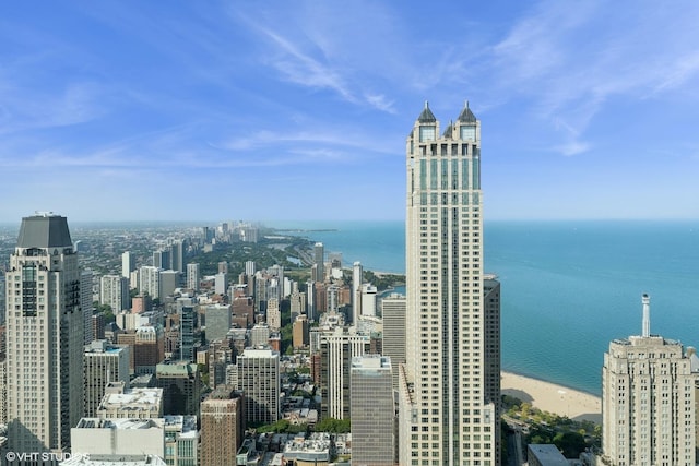 property's view of city featuring a view of the beach and a water view