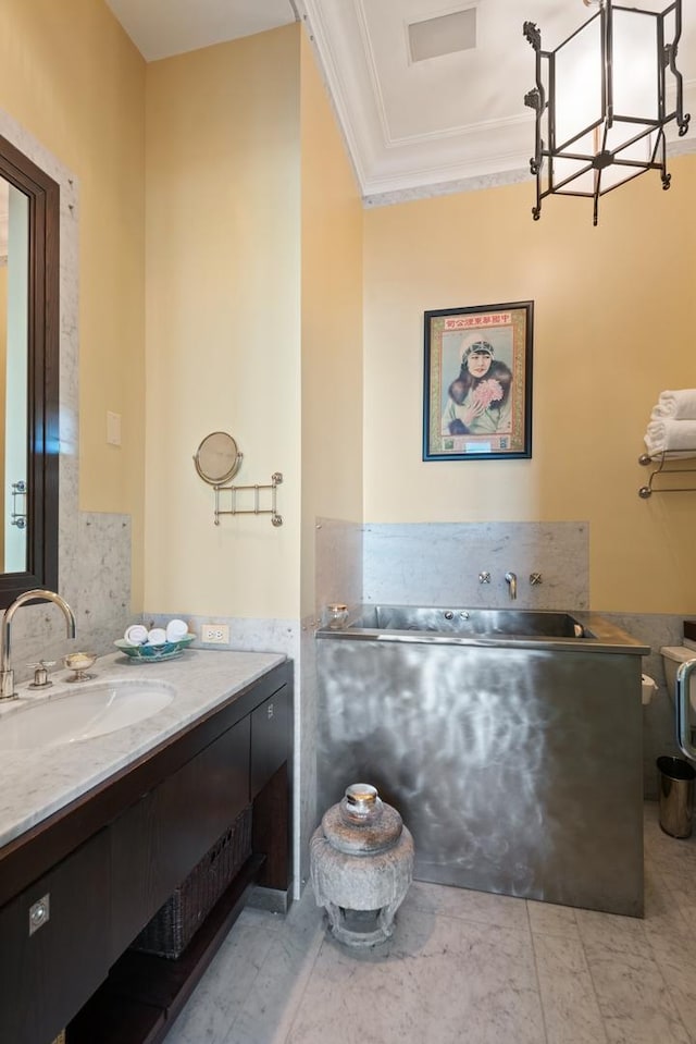 bathroom with vanity, tile patterned floors, and ornamental molding