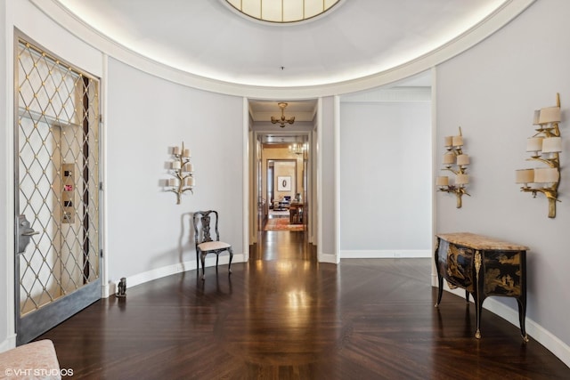 foyer entrance featuring an inviting chandelier