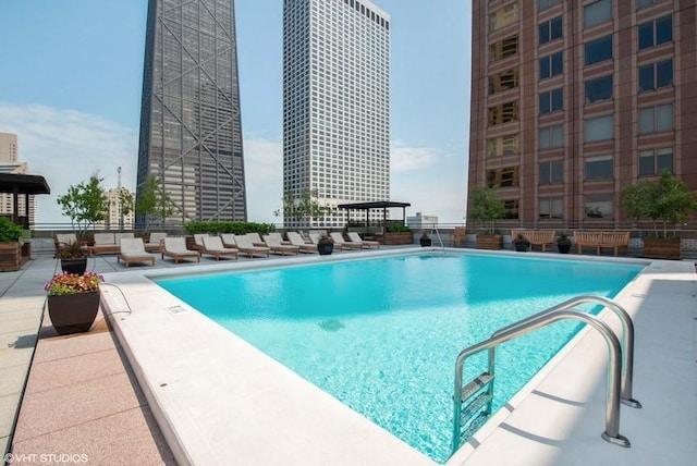 view of swimming pool featuring a patio