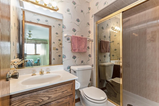 full bath featuring toilet, wallpapered walls, and a stall shower