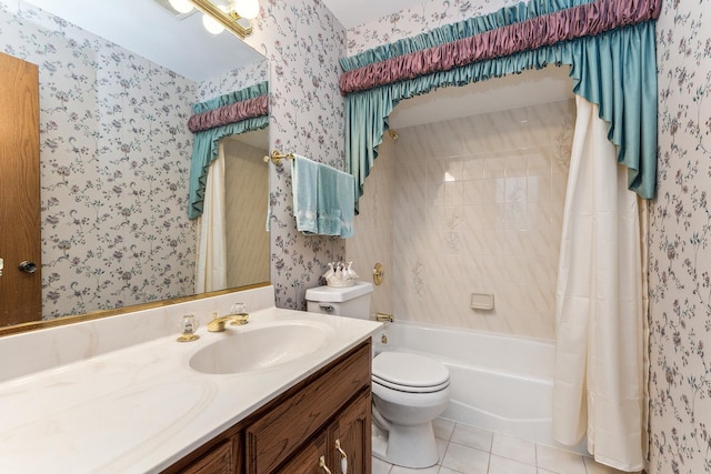 full bath with vanity, tile patterned floors, toilet, and wallpapered walls