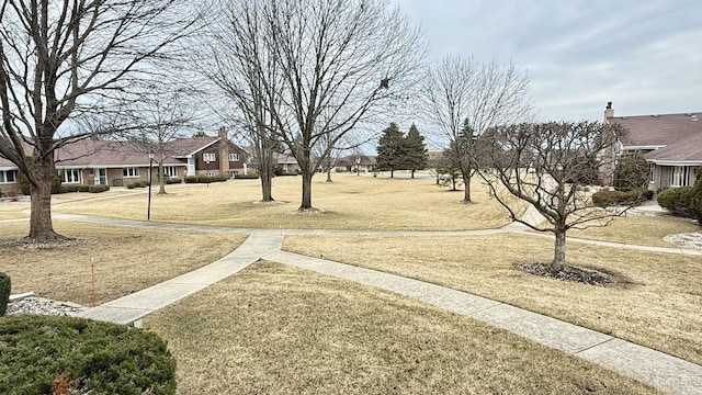 surrounding community featuring a lawn