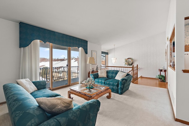 living room with carpet floors and baseboards