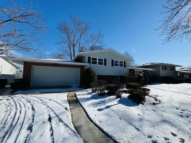 split level home featuring a garage