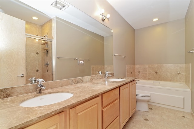 full bathroom with tile patterned flooring, toilet, vanity, and plus walk in shower