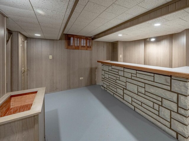 additional living space with lofted ceiling and light wood-type flooring