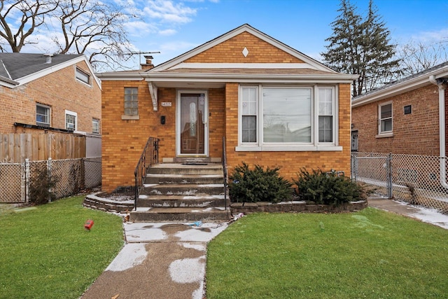 bungalow-style home with a front yard, brick siding, fence, and a chimney