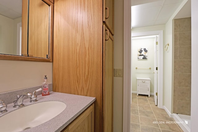 bathroom with vanity and tile patterned flooring