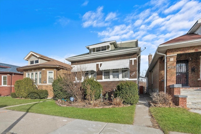 view of front facade with a front yard